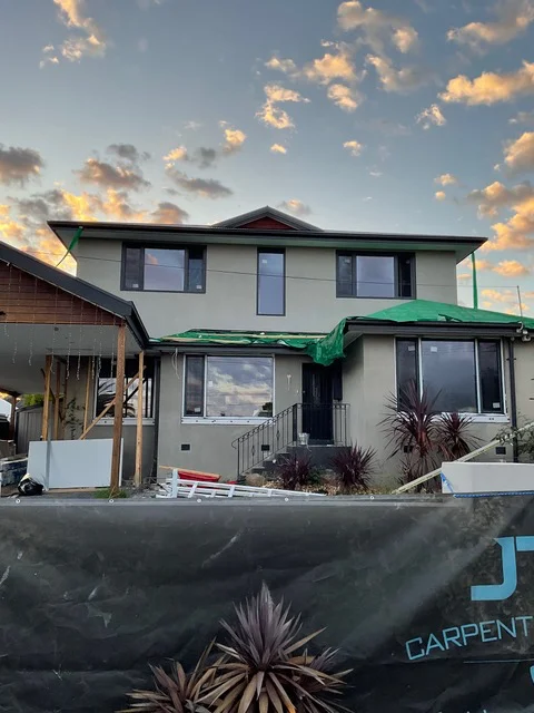 Completed two-storey extension in Melbourne's eastern suburbs at dusk