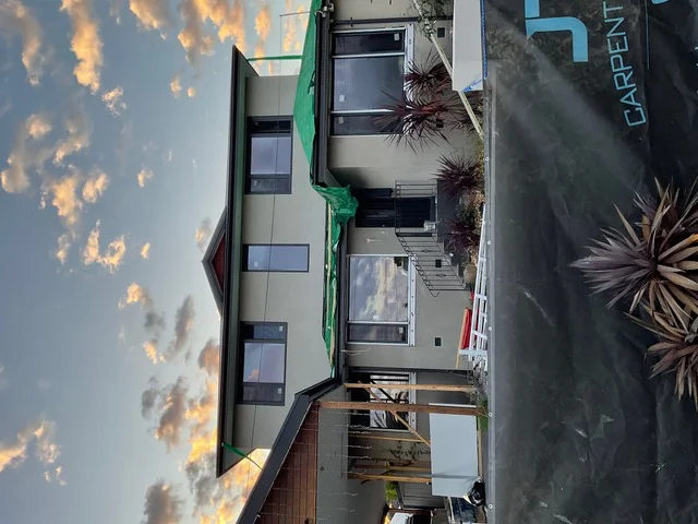 Completed two-storey extension in Melbourne's eastern suburbs at dusk