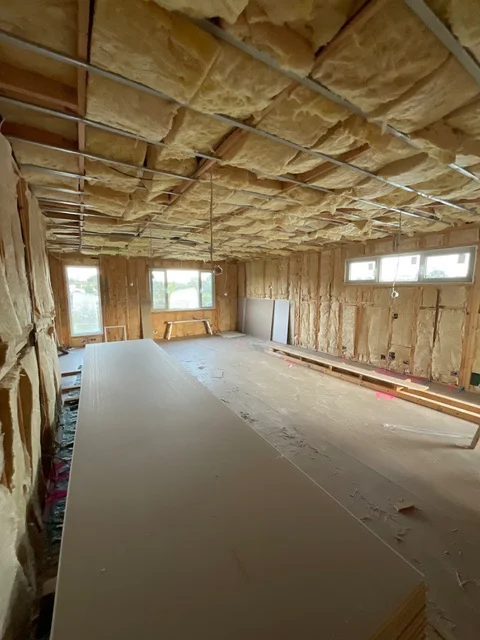 Upper level of a second storey extension with insulation complete
